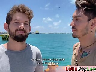 Latin guys celebrate gay pride on the beach outdoor